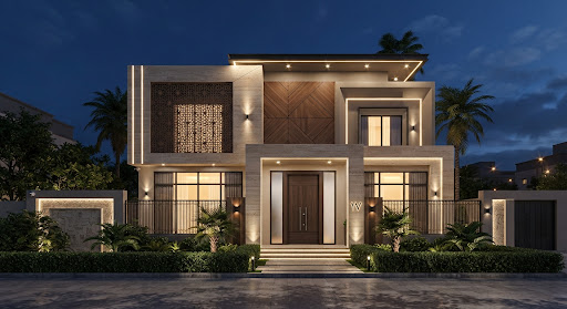A modern Saudi house facade at night, showcasing elegant architectural lighting that highlights the stone textures and geometric wooden panels. The design is clean and institutional, emphasizing high-end luxury and security.